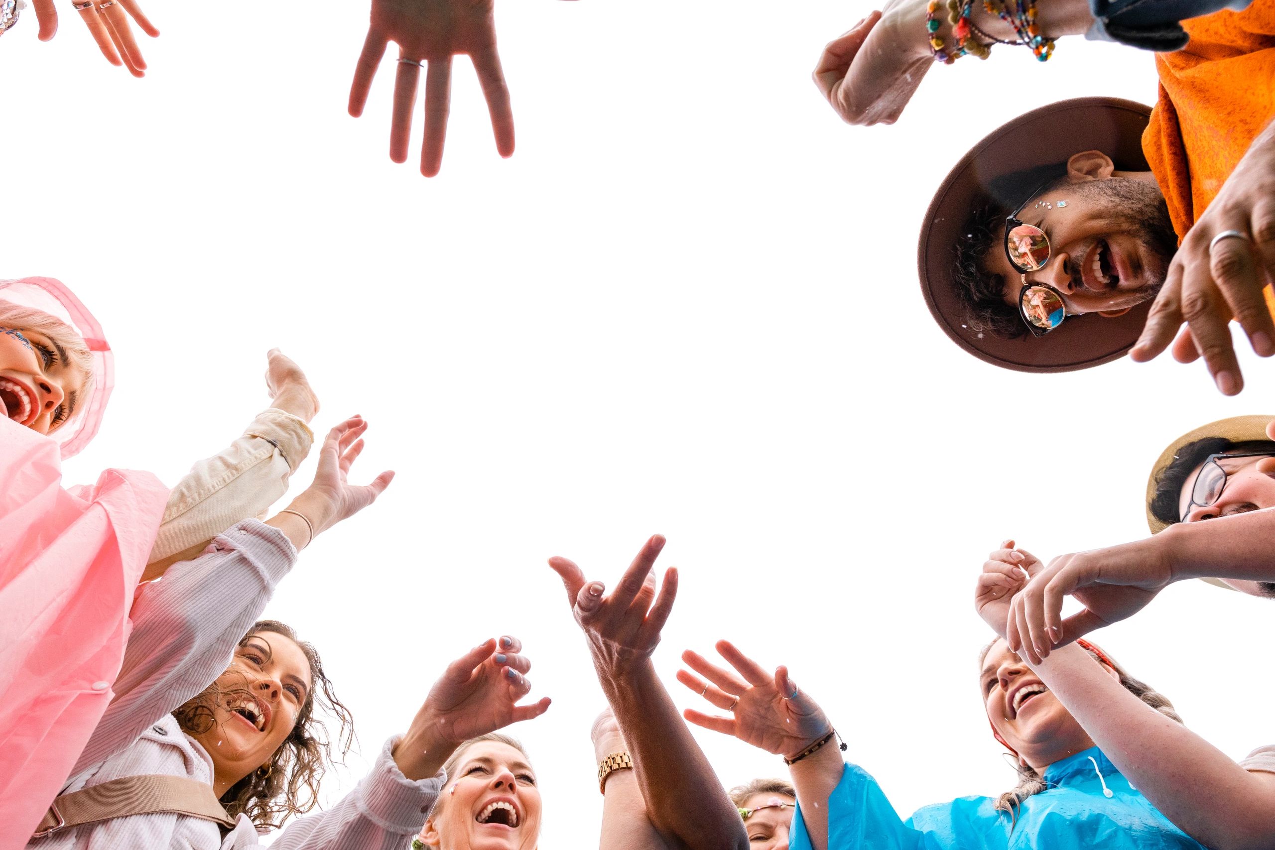 Group of people joyfully gathered together outdoors